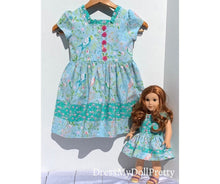 Load image into Gallery viewer, Parakeet dress in pastel greens.
